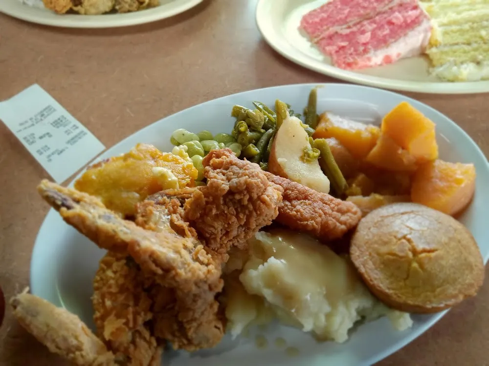 Mashed Potatoes with Gravy Fried Chicken Wings Rutabaga Cornbread Muffin and Mac and Cheese